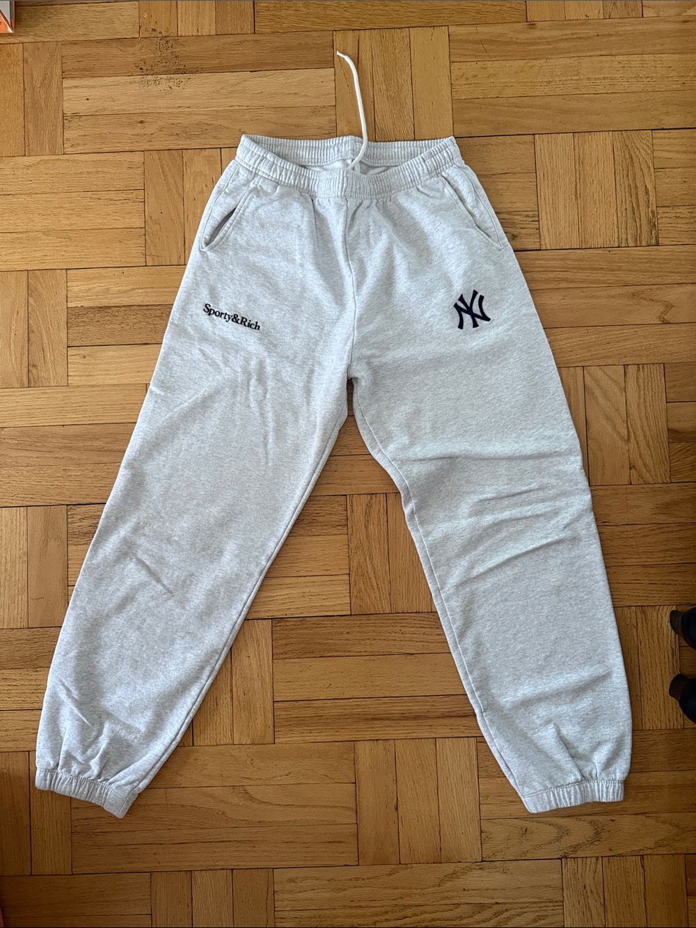 Sporty & Rich Light Gray Sweatpants with Navy NY Logo